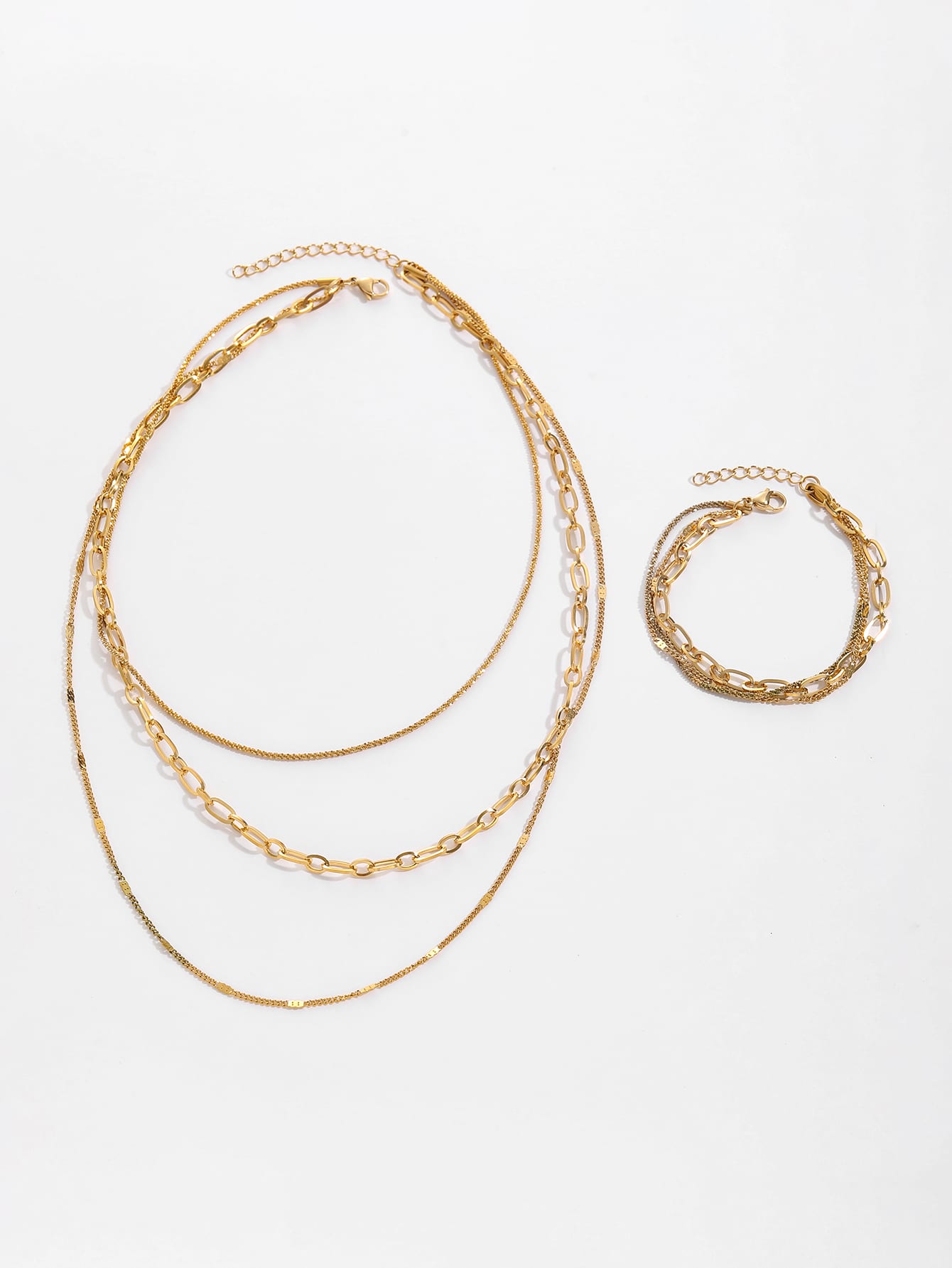Zeitloses mehrreihiges Gold-Halsketten- und Armband-Set