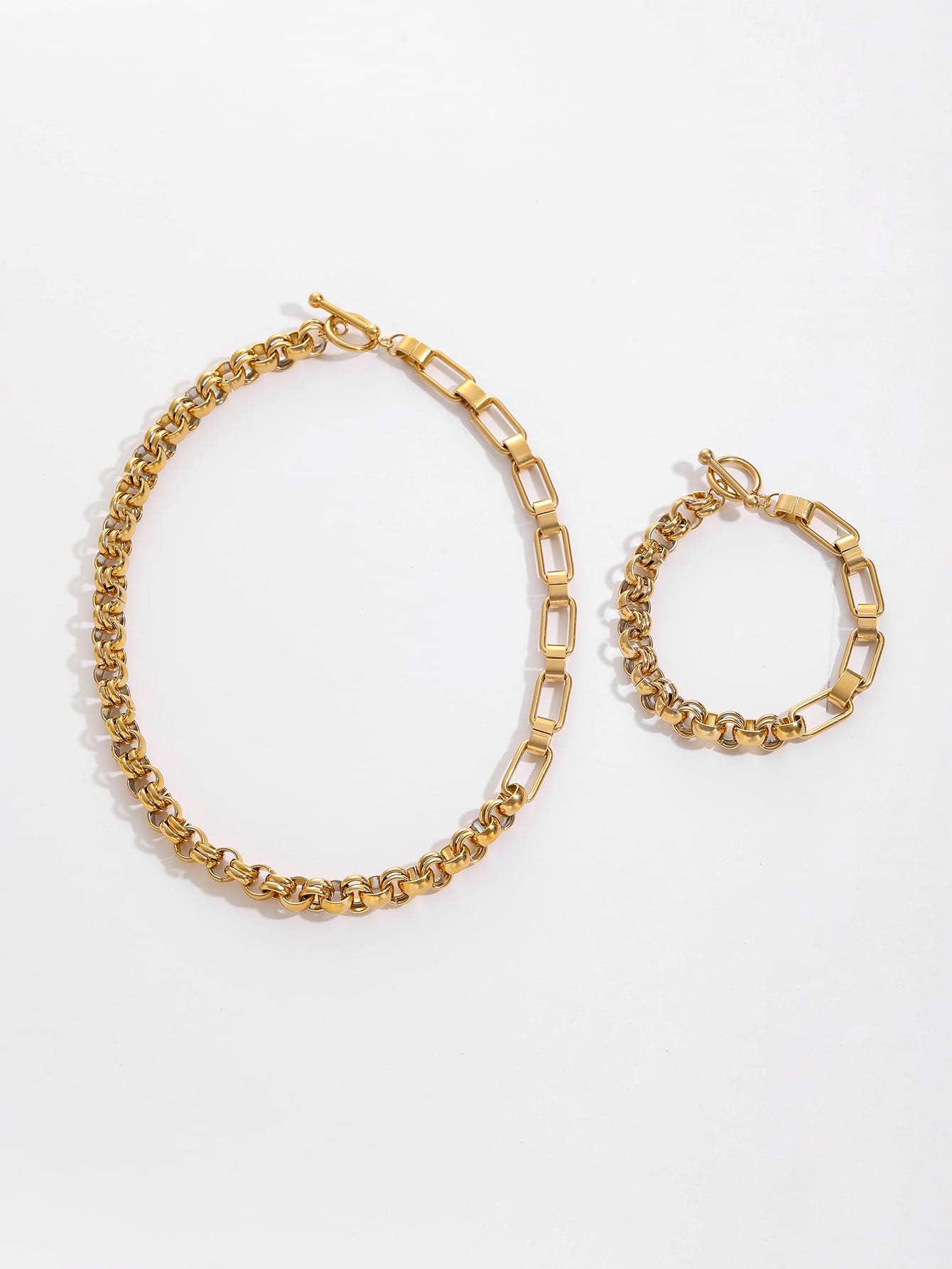 Geometriskt guldpläterat halsband- och armbandsset