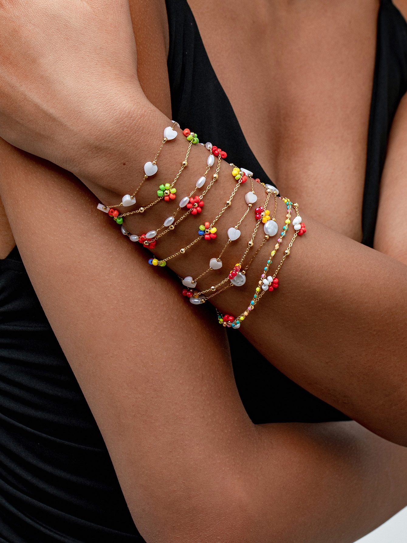 Hjärta & blomma flersträngat armbandsset