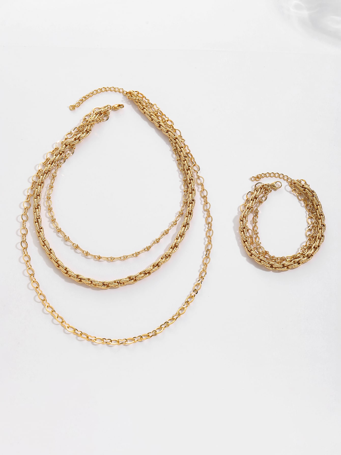 Layered Glow Multi-Chain guldhalsband & armbandsset