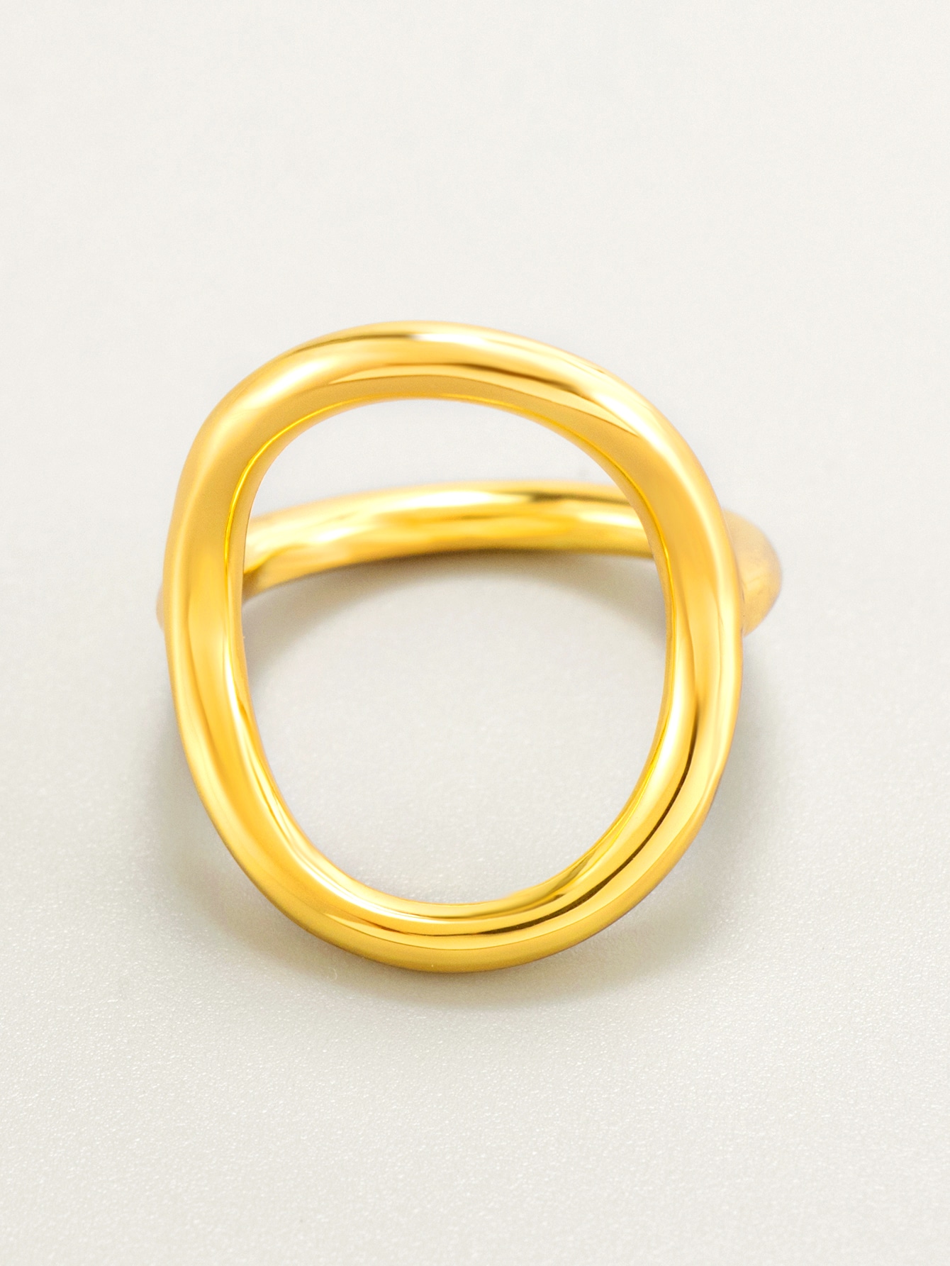 Rostfritt stål, guldpläterad, oregelbunden oval ring